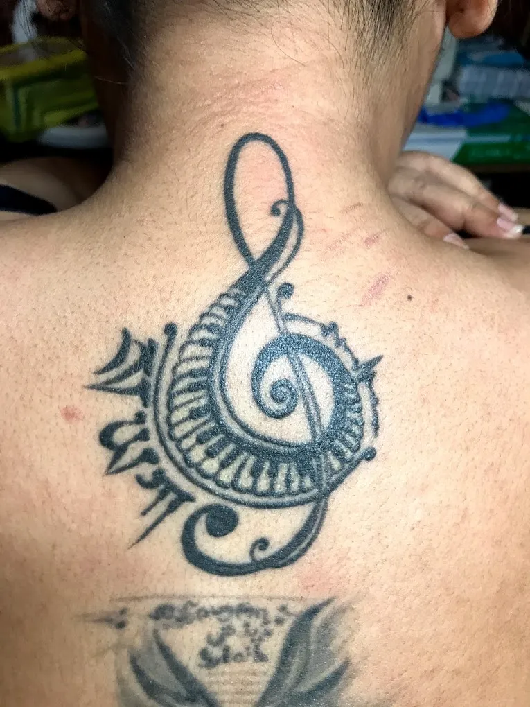 Needle Scratch Tattoo Studio